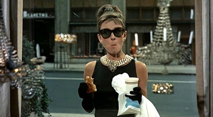 Audrey Hepburn donned a dress designed by Hubert de Givenchy in the opening of the 1961 romantic comedy film Breakfast at Tiffany's