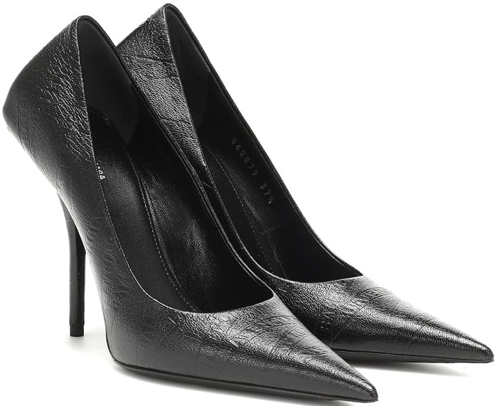 Balenciaga's take on wear-anywhere black stiletto pumps come sharply angled – with exaggerated, reinforced flat heel counters, and precisely pointed toes – for a twist on a classic silhouette