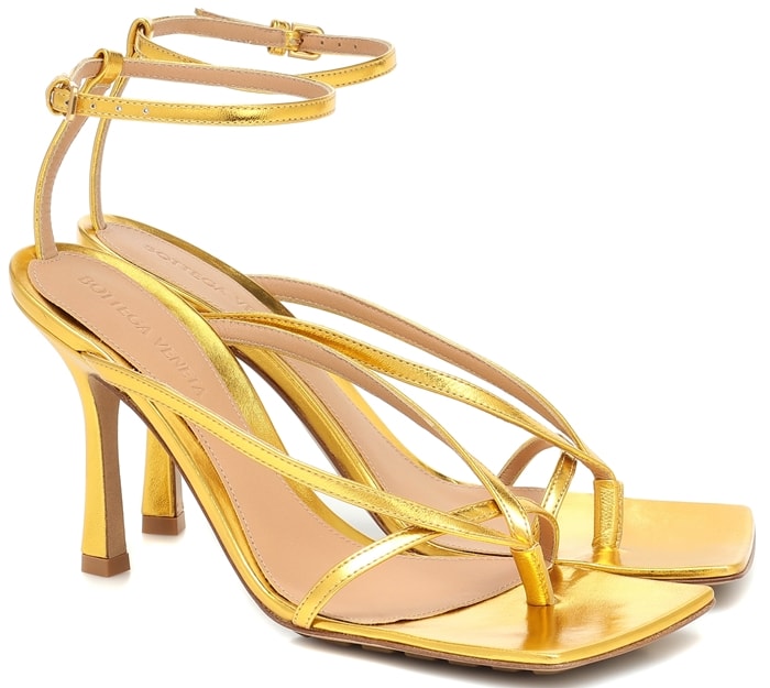 Take shimmering strides in these strappy sandals from Bottega Veneta