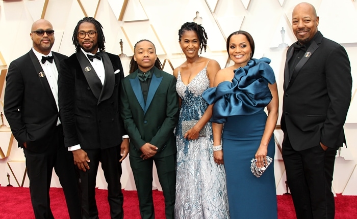 Director Matthew A. Cherry (2nd L), producer Karen Rupert Toliver (2nd R), Deandre Arnold, and family members attend the 92nd Annual Academy Awards