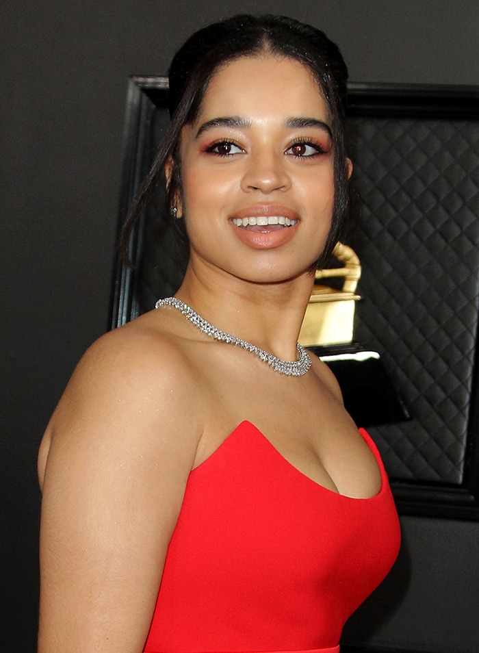 Ella Mai teams her dress with red eyeshadow