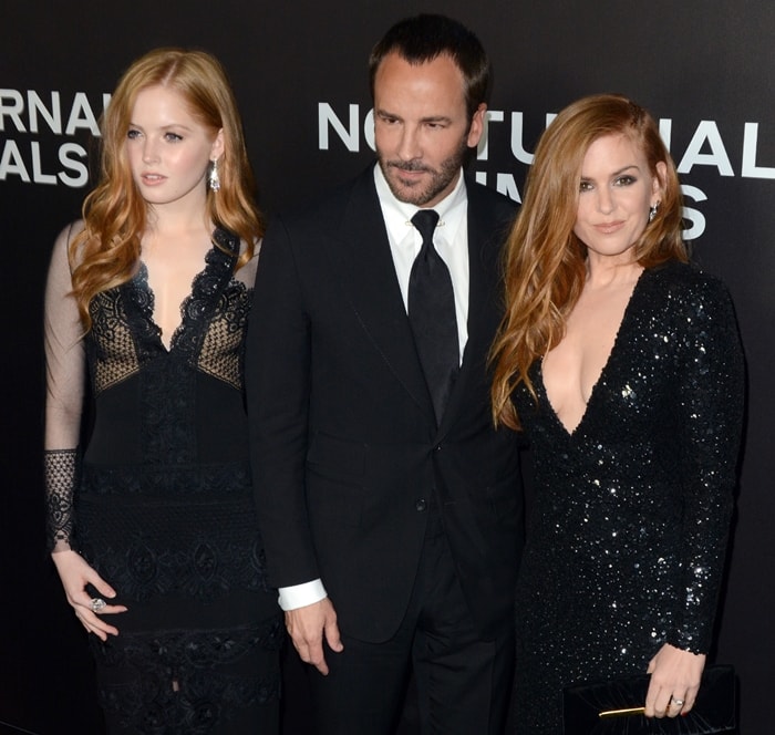 Actress Ellie Bamber, director Tom Ford, and actress Isla Fisher attend the Nocturnal Animals