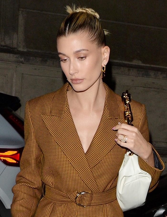 Hailey Bieber looks beautiful with neutral makeup and neat bun