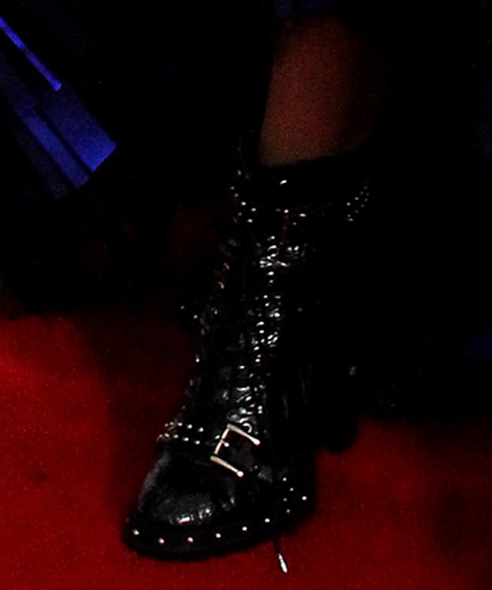 Jameela Jamil slips into a pair of studded boots by Pretty Little Thing