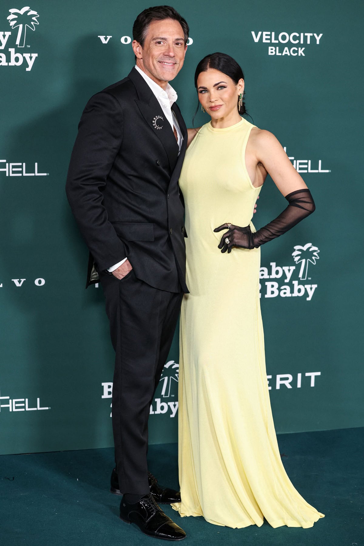 Jenna Dewan stuns in a Hollywood-glamour yellow Jacquemus gown, perfectly complemented by Steve Kazee's classic black suit at the 2024 Baby2Baby Gala
