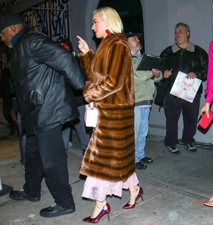 Katy Perry in a coat by MAREI 1998, a fashion house founded and helmed by the young designer Maya Reik
