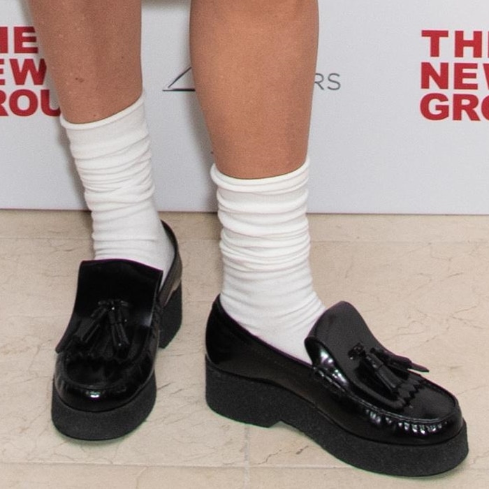 Chloë Sevigny wears black loafers with white ankle socks