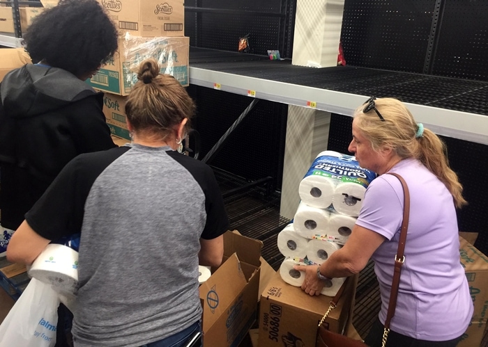 Corona shoppers stockpiling toilet paper at Walmart Supercenter