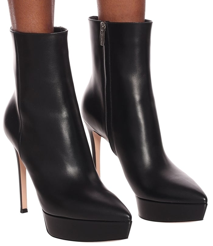 Black leather Dasha platform booties from Gianvito Rossi featuring a pointed toe, an ankle length, a side zip fastening, a platform sole and a high stiletto heel