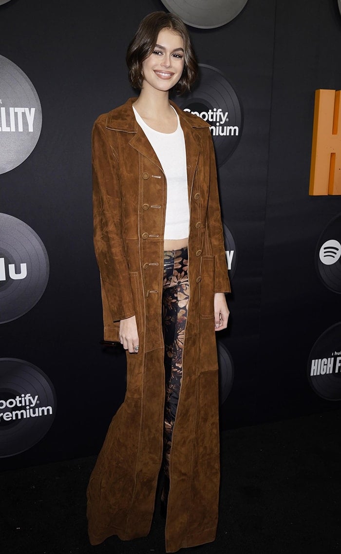Kaia Gerber in Charlotte Knowles pants and Fendi trench coat at the premiere of Hulu's High Fidelity on February 13, 2020