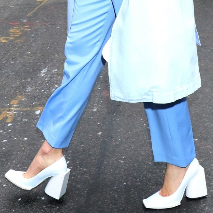 Karlie Kloss rocked white leather pumps with a high block heel and an exaggerated square toe