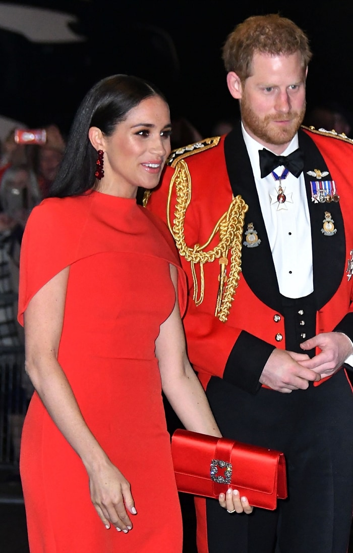 Meghan Markle's red Safiyaa Kalika cape dress and Capri bag from Manolo Blahnik