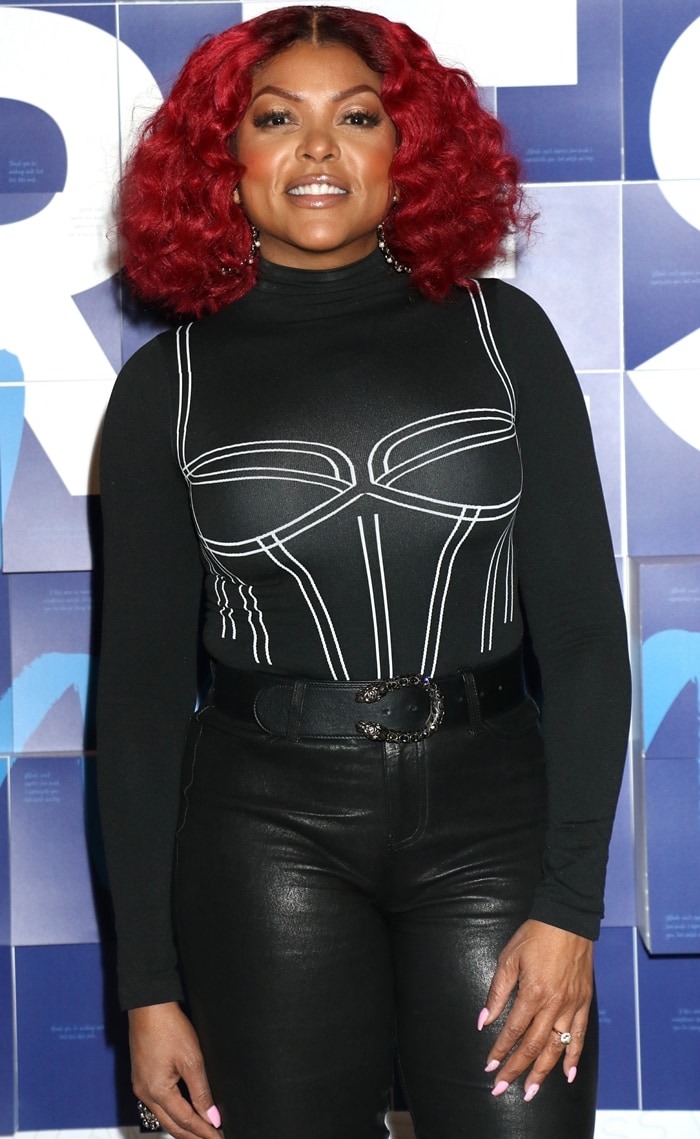 Taraji P. Henson turns heads in a curve-hugging Theresa string bodysuit by Wolford, paired with high-waisted cropped leather Adelaide jeans from L’Agence—a sleek, fashion-forward combo that highlights her bold style
