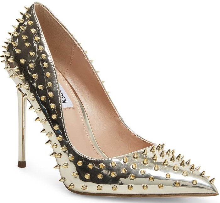 Spiky studs add rocker-chic attitude to a pointed-toe pump lifted by a stiletto heel