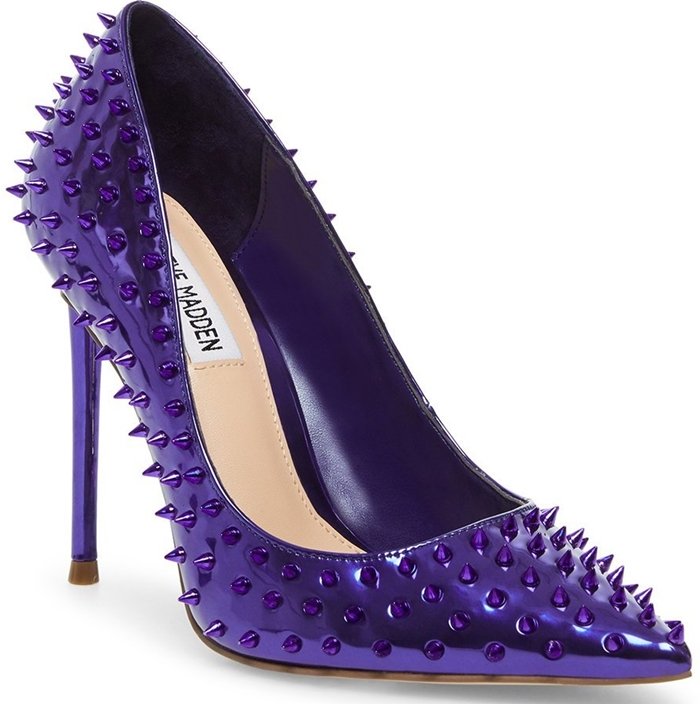 Spiky studs add rocker-chic attitude to a pointed-toe pump lifted by a stiletto heel