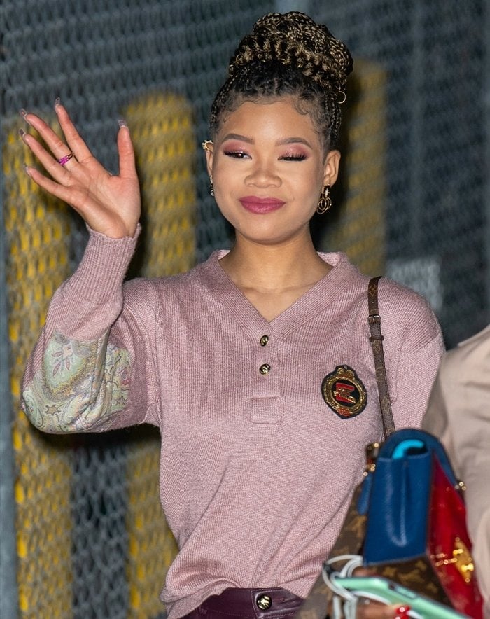 Storm Reid's pink paisley patch print logo-embellished top