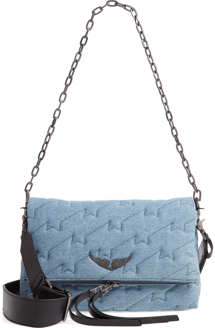 Vintage-wash denim textured with lightning-bolt quilting brings a touch of rock 'n' roll edge to a versatile bag finished with signature metal wings