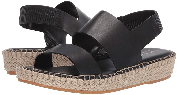 Ropes of braided jute wrap the low platform sole of a sandal styled for supreme comfort with signature cushioning in the footbed and a soft elastic heel strap