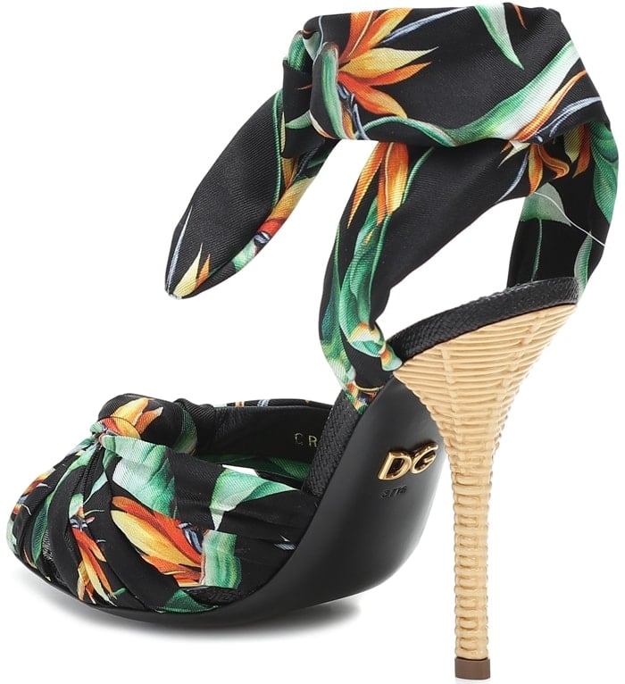 Printed with brightly-colored birds of paradise and lush foliage, these Dolce & Gabbana sandals are made with silk twill straps that reference '50s-era pin-up styles