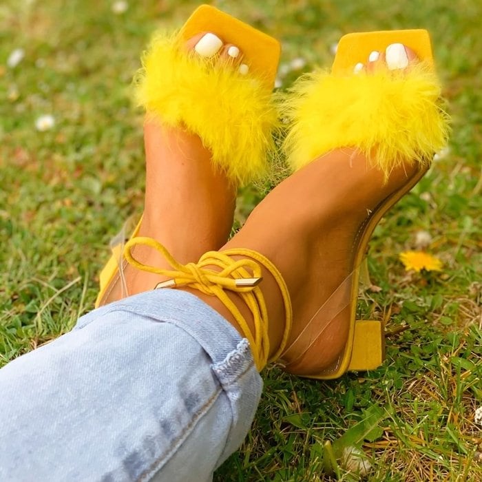 Give your look an instantly cute touch with these yellow block heeled sandals