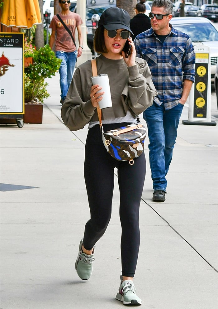 Lucy Hale heads to the gym in sweater and leggings in Studio City
