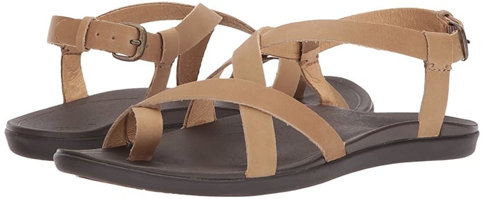 Crisscrossed leather straps top a toe-loop sandal designed with a cushioned, anatomically-molded footbed and durable rubber sole for supreme comfort and traction