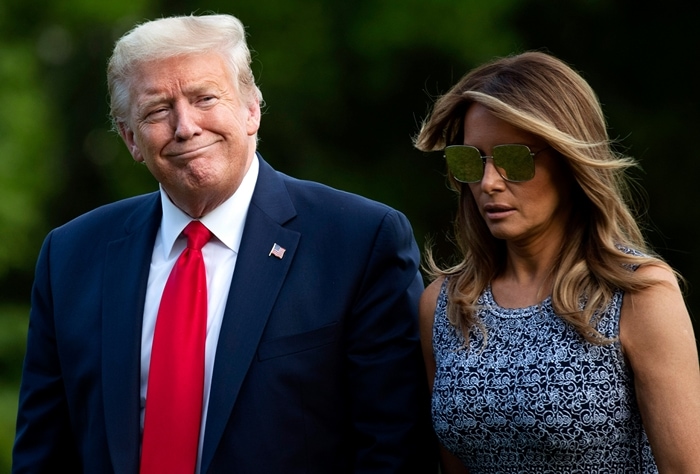 Melania Trump wore a patterned white and blue midi dress