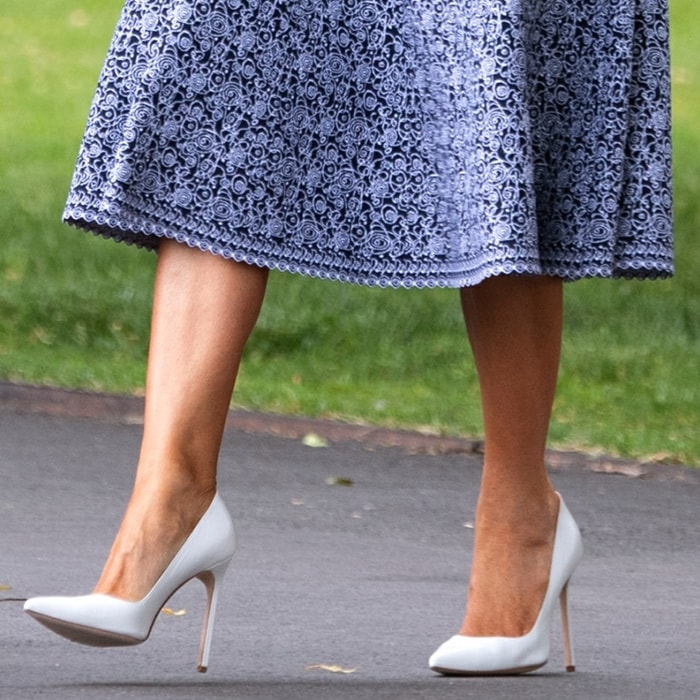 Melania Trump Tours NASA Headquarters in White Manolo Blahnik Pumps