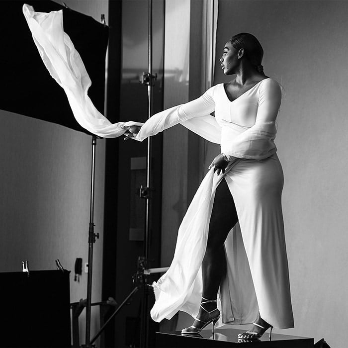 Serena Williams is ethereal in a white dress with strappy thong sandals