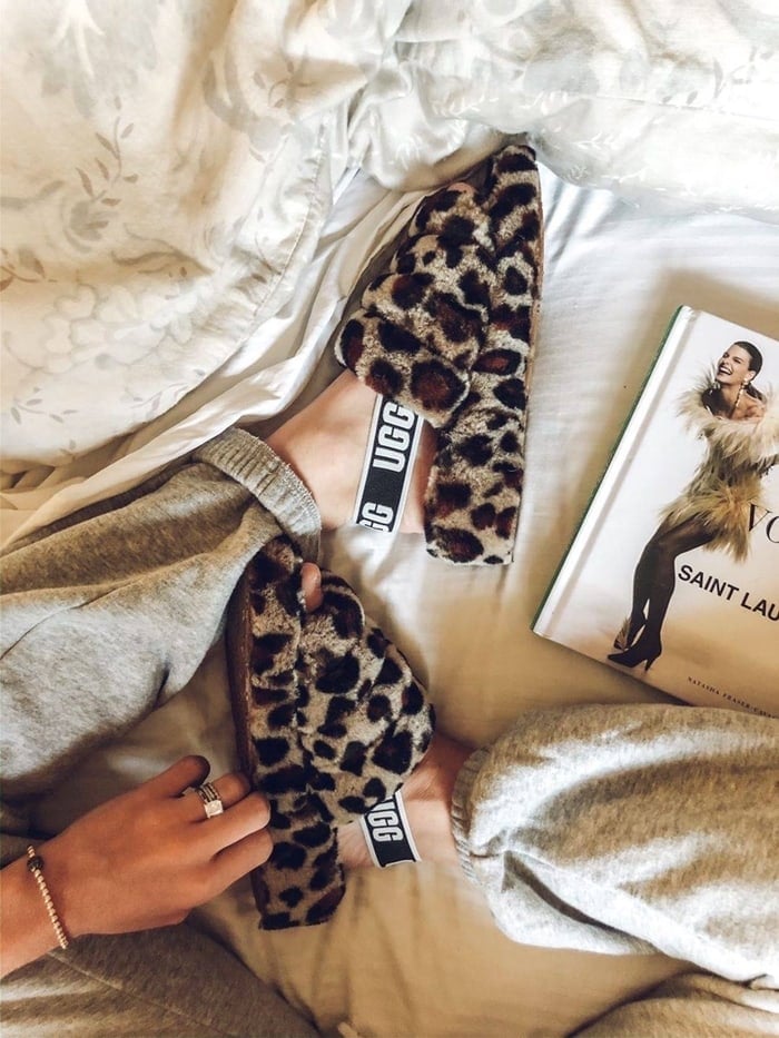 Step out in style with this genuine-shearling leopard print slingback that combines the warm-weather appeal of a sandal with the plush comfort of your favorite slipper