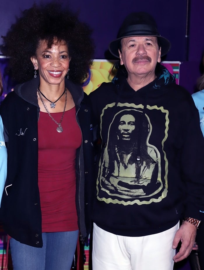 Carlos Santana with his wife Cindy Blackman Santana participate in the Philharmonic's global edition of the orKIDStra music education program for a group of students at the Discovery Children's Museum