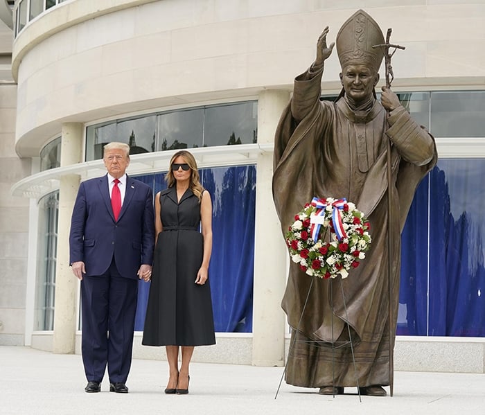 Donald Trump and Melania Trump honor Saint John Paul II with a ceremonial wreath 