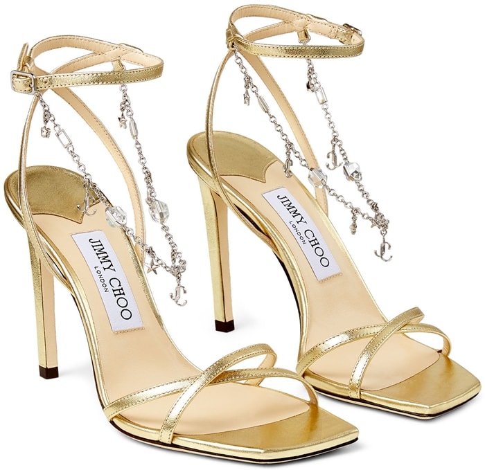 Jimmy Choo's new season Metz 100mm sandals have been designed with a delicate star and logo charm anklet to reignite all your memories from childhood