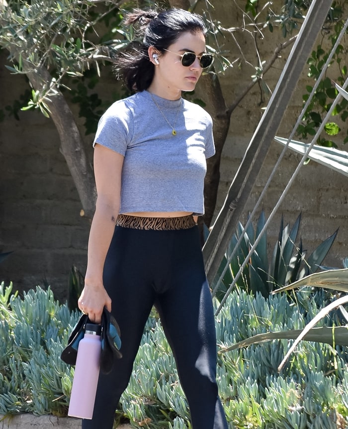Lucy Hale totes a pink HydroFlask water bottle