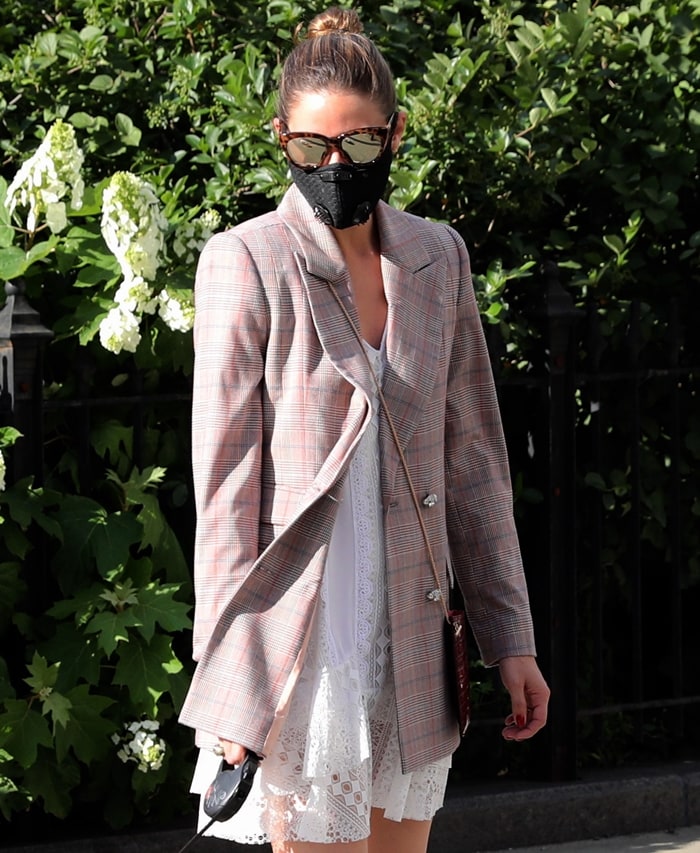 The cat-eye frame of Olivia Palermo's Le Specs sunglasses adds a touch of style