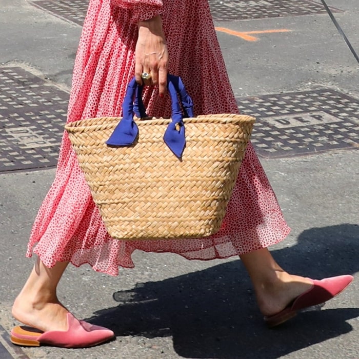 Olivia Palermo opted for pink velvet mules from Le Monde Beryl, a luxury shoes, accessories, and jewelry brand based in London and founded by friends Lily Atherton Hanbury and Katya Shyfrin