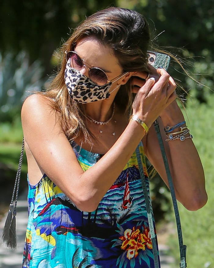 Alessandra Ambrosio wears a leopard-print mask