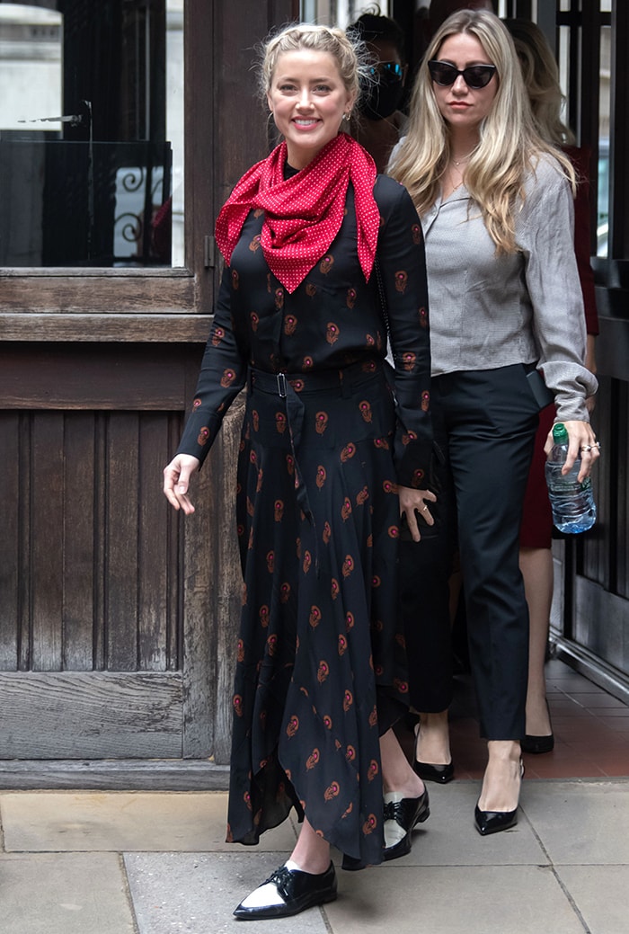 Amber Heard dons a feminine floral-printed black maxi dress with oxford shoes on July 15, 2020