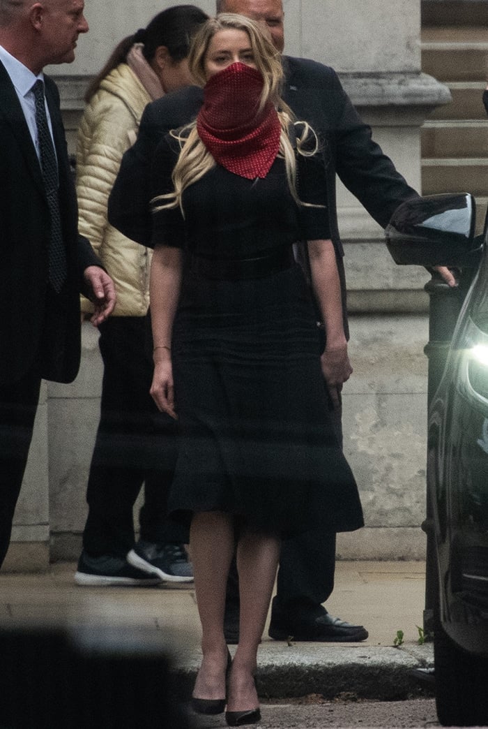 Amber Heard attends the first day of libel trial against The Sun as its star witness on July 7, 2020