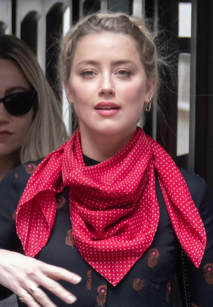 Amber Heard puts her blonde tresses up into a braided updo