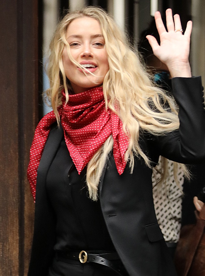 Amber Heard still wears her dotted red scarf for the eight day of court hearing