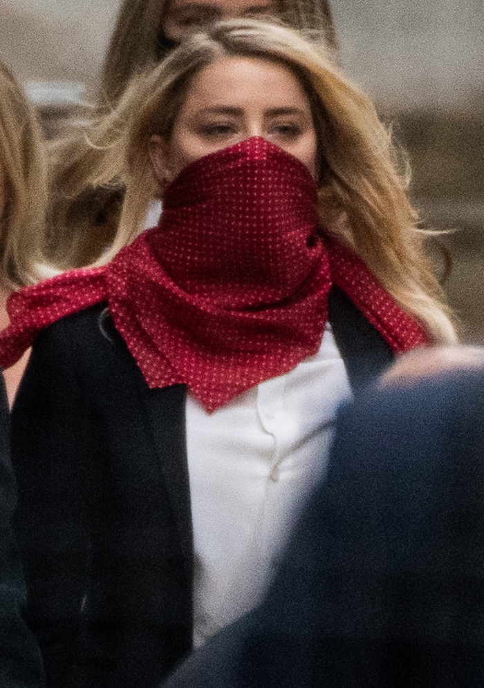 Amber Heard trades her dresses for a power suit for the third trial day in London on July 9, 2020