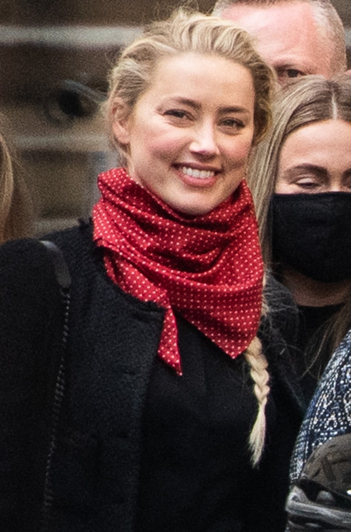 Amber Heard wears her polka-dot red scarf with black tweed blazer and skirt