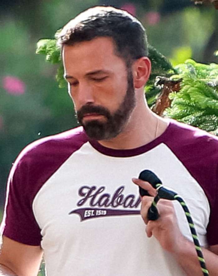 Ben Affleck sports a refreshed look with a darker-dyed beard and hair, giving him a noticeably younger appearance