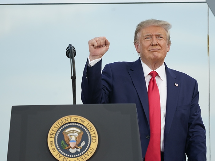 President Donald Trump addresses the guests at the White House