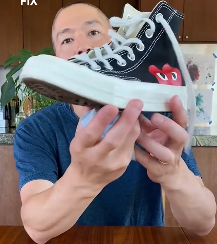 Jason Markk shows off the cleaned Chuck Taylor high top sneakers