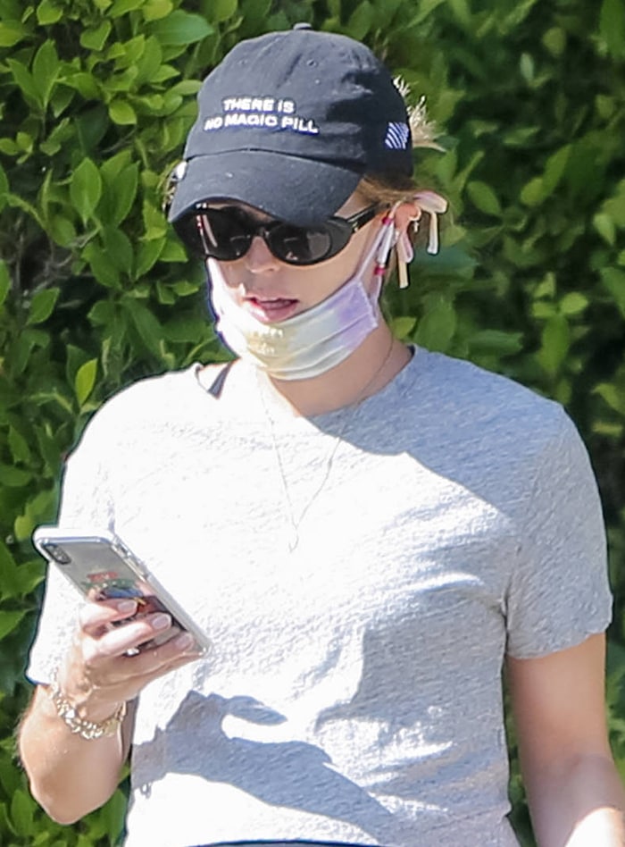 Katherine Schwarzenegger keeps safe with a tie-dye face mask