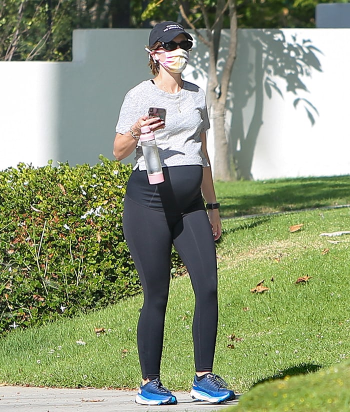 Katherine Schwarzenegger wears maternity leggings with a gray tee