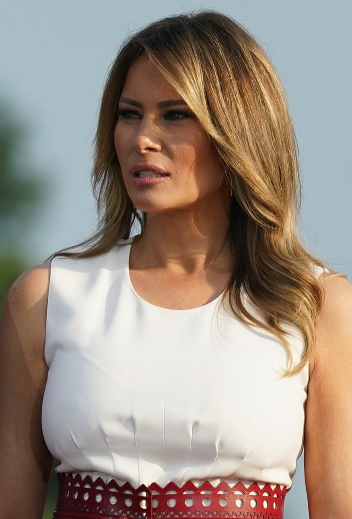 Melania Trump wears her brown hair down with caramel blonde highlights