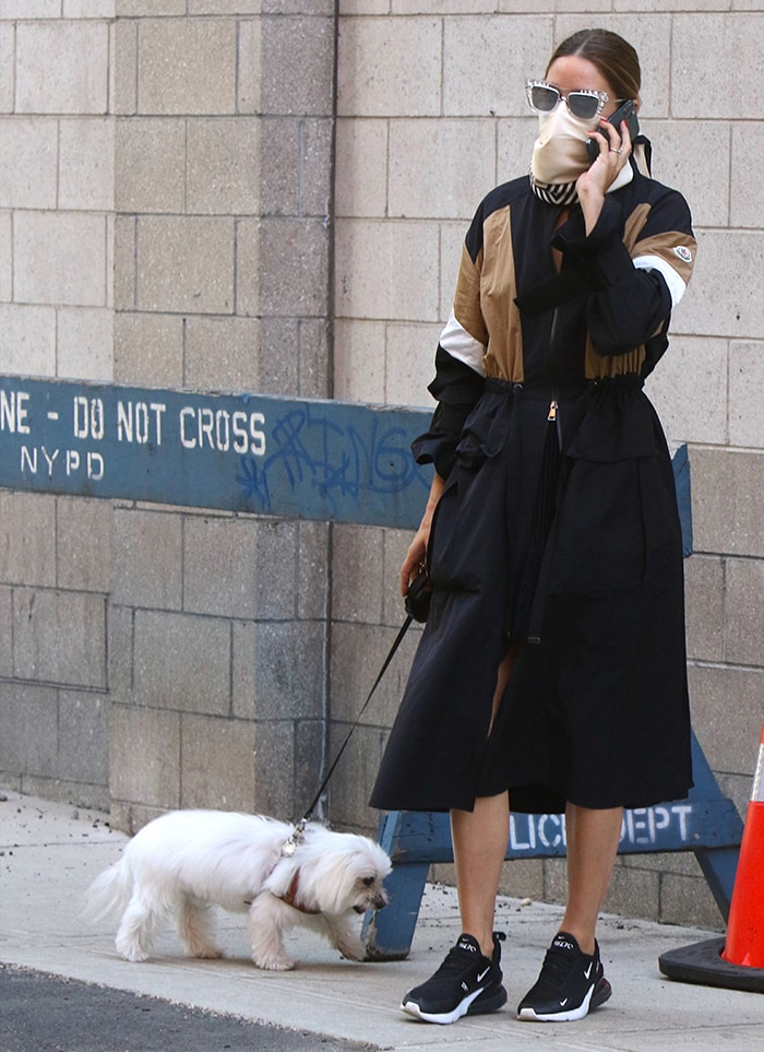 Olivia Palermo wears a black Moncler Zinzolin parka coat for her afternoon walk